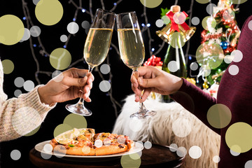 Group of friends having drinks at the party. Young people enjoying at a bar toasting cocktails. making good cheer.