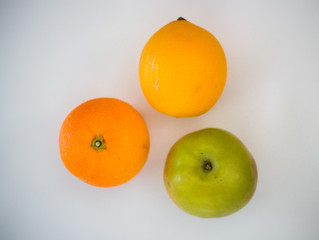 Apple, orange, lemon, on a white background, healthy life, vitamins, fruits