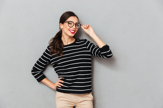 Portrait of a smiling businesswoman in eyeglasses