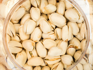texture of dry roasted pistachios nut on white background