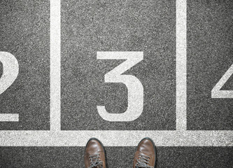 Fototapeta premium Number two three four on start line on road, start point, competition, race