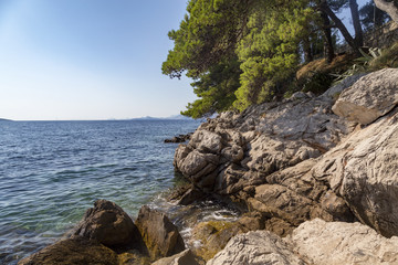 Swimming area among rocky boulders in Cavtat, Croatia.