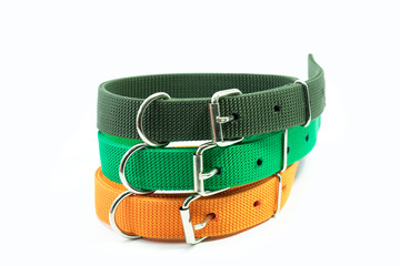 Pet supplies about collars stack for pet on white background.