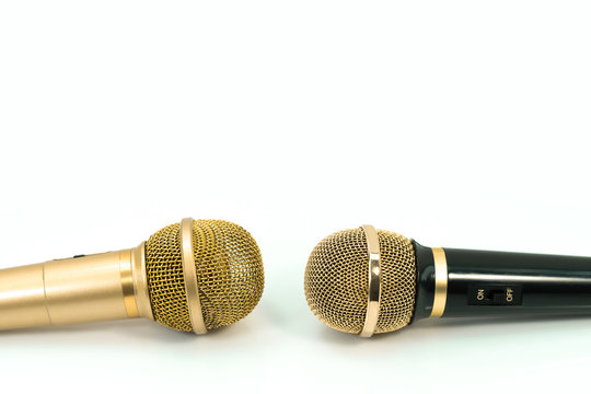 Two microphone isolated on white background. Battle Singing competitions concept.