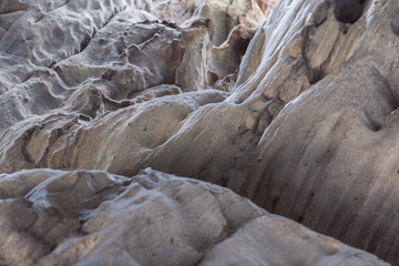 Stone texture in snow and ice. Mountain wall. Rock texture.