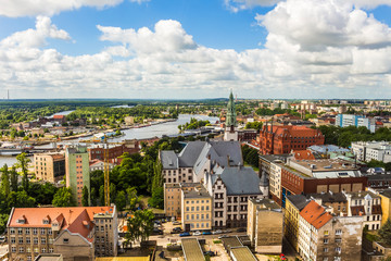 Naklejka na ściany i meble Szczecin - krajobraz miasta z rzeka Odrą, widziany z punktu widokowego w Bazylice. 