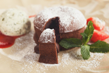 Chocolate fondant with vanilla ice cream and strawberry