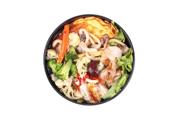 Fried big noodle  with omelet topped mixed vegetable in soup.