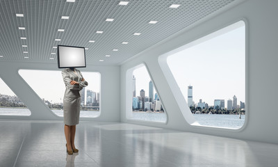 Business woman with TV instead of head.