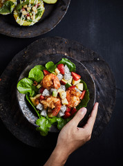 Tasty meal with fresh and healthy prawn salad and vegetables.
