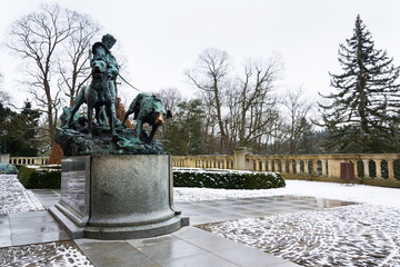 Bronze statue dog handler at Konopiste castle, Czech Republic
