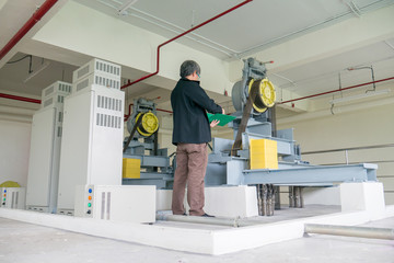 Engineer check elevator system