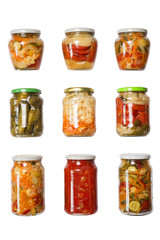 Preserving a variety of vegetable salads in glass jars homemade isolated on a white background