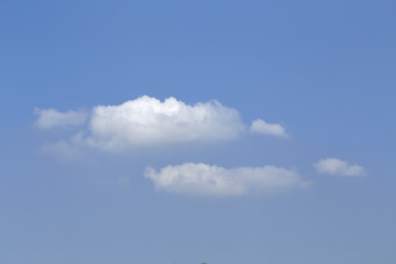 blue sky background with a tiny clouds