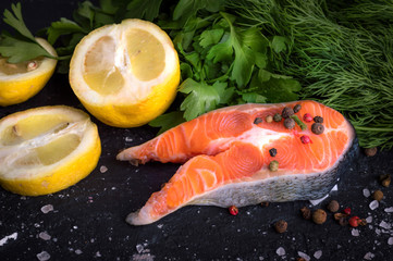 Salmon on a wooden table. Cooking fish