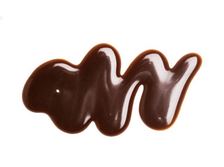 Chocolate caramel sauce ripple on a plain white backround