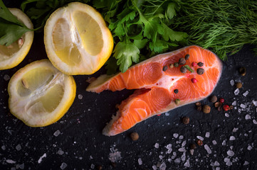 Salmon on a wooden table. Cooking fish