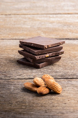 chocolate with almond on wooden