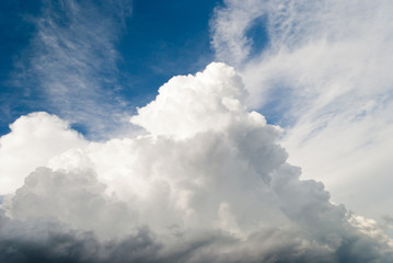 Fototapeta premium beautiful big white high clouds gray storm clouds before the rain blue sky summer day landscape magnificent