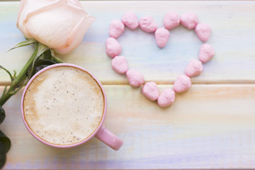 Background with coffee and a rose