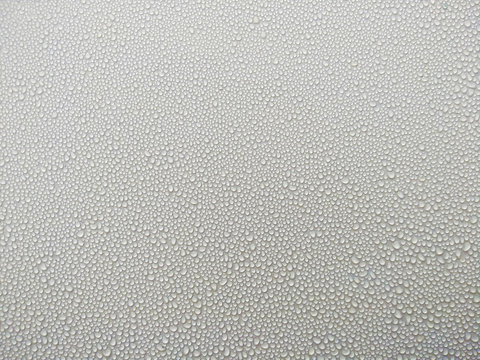 abstract background water drops on glass,raindrops on window glass,dew and moisture with wet floor,wet floor and raindrop on hood