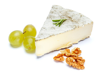 traditional french brie cheese on a white background