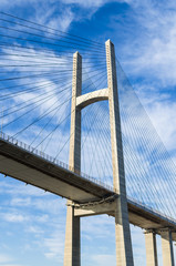 Bottom view of the bridge at Suez Canal. Fragment of bridge on a background of bright blue sky