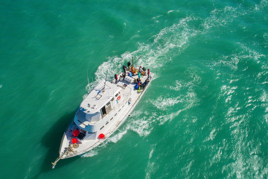 Aerial image of a fishing boat in the ocean