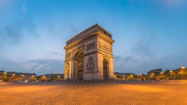 Paris city skyline night to day timelapse at Arc de Triomphe and Champs Elysees, Paris, France 4K Time lapse