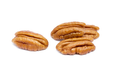 Fresh pecan nuts isolated on a white background