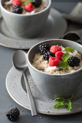 healthy breakfast oatmeal porridge with raspberry blackberry