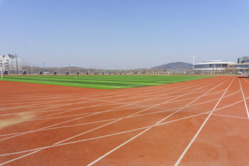 Track and field red plastic runway