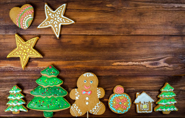 Fototapeta na wymiar Christmas homemade gingerbread cookies on wooden table