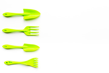 Gardening equipment concept on white background top view copy space