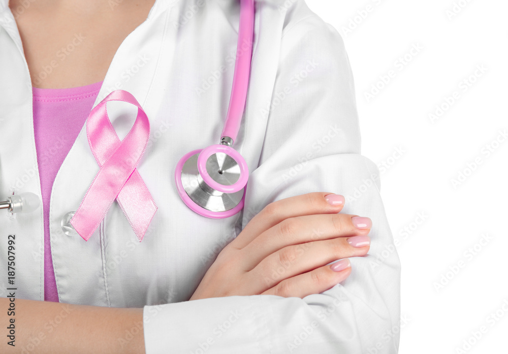 Canvas Prints Doctor with pink ribbon on robe against white background. Breast cancer awareness concept