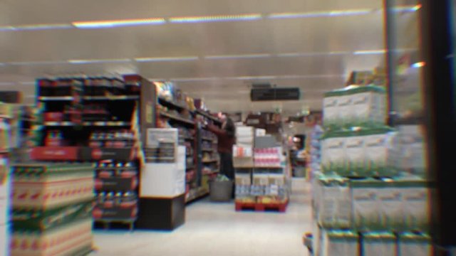Shopping In Supermarket Time Lapse. Time Lapse of a shopping cart in a supermarket with people shopping