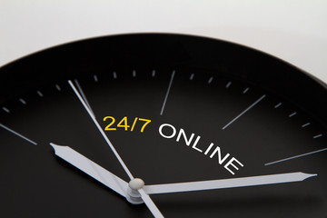 Business concept - clock - 24/7 online