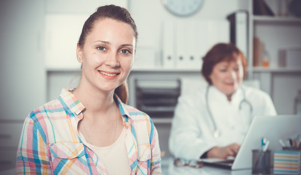 Adult female doctor leading medical appointment