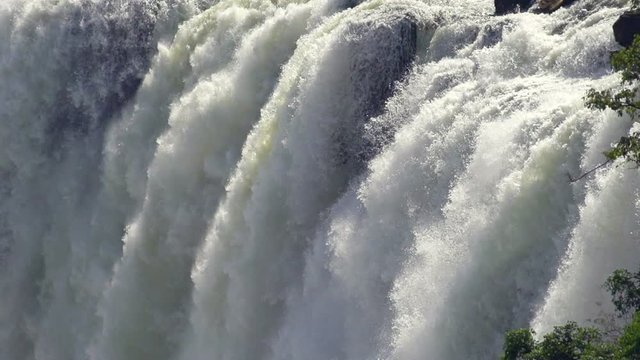 Slow motion of the beautiful Victoria Falls on the border of Zambia and Zimbabwe.