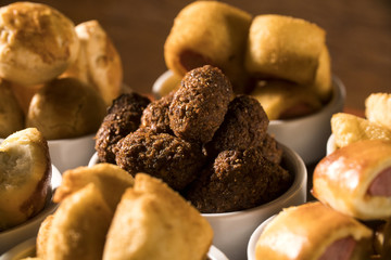 Mixed brazilian snack on the table.