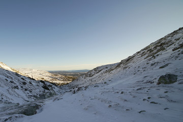 Fototapeta na wymiar View of snowy mountain area.