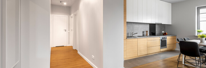 White apartment with hardwood floor