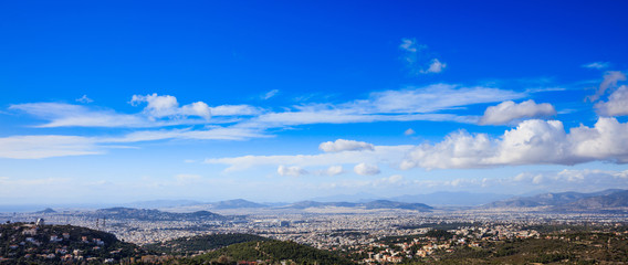 Fototapeta na wymiar Greece, Athens. Panoramic view on blue sky background