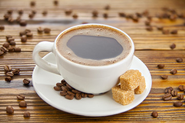 coffee in coffee cup with natural grains