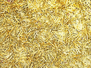 Golden shiny christmas garland, festive tinsel background