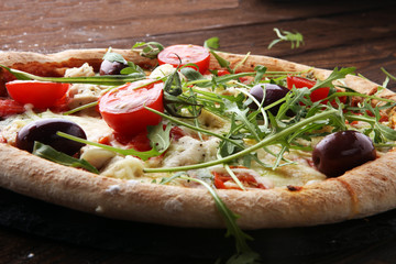 pizza with cheese fresh baked pizza coming out of the oven