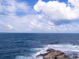 Landscape of the sea, the waves, the beautiful cloudy sky.