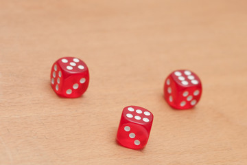 Red dices on the table