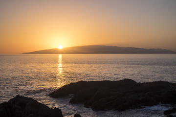 Obraz premium Sunset over La Gomera, Canary Islands from Los Gigantes tenerife 