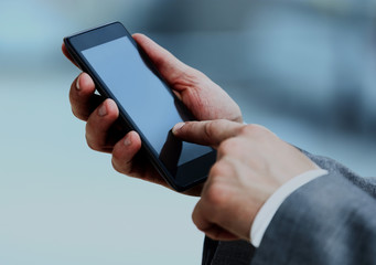 Man hand holding phone.